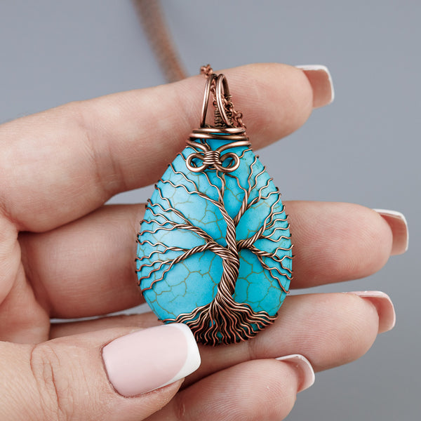 Copper tree of life necklace with turquoise blue howlite stone