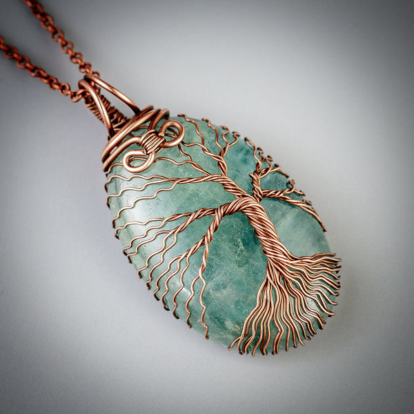Handmade copper tree of life necklace with natural aquamarine crystal