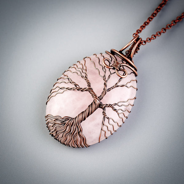 Handmade copper tree of life pendant with natural rose quartz crystal
