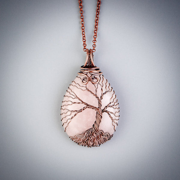 Unique copper tree of life pendant with natural rose quartz crystal