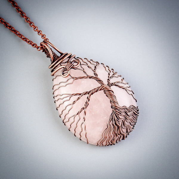 Unique copper tree of life pendant with natural rose quartz crystal