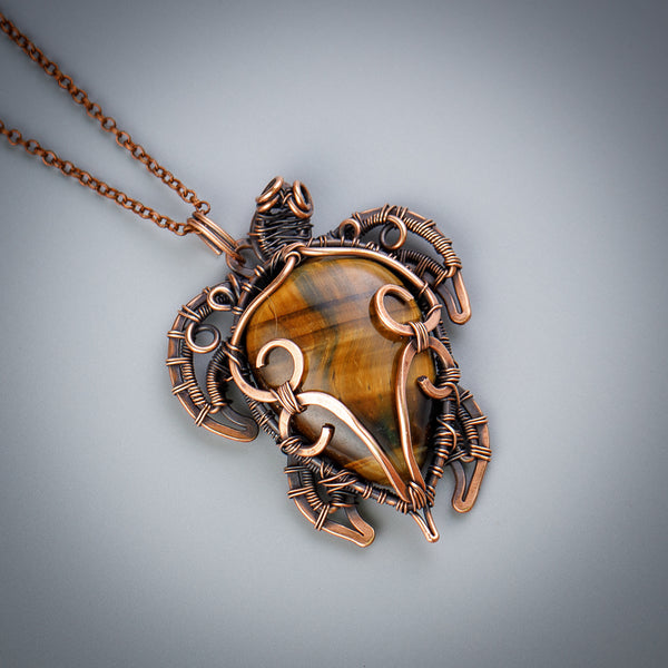 Handcrafted turtle pendant with natural tiger eye stone