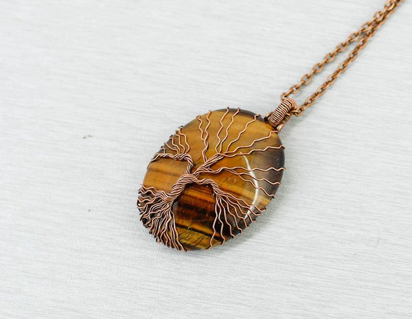 Matching tiger eye tree of life necklaces for friends