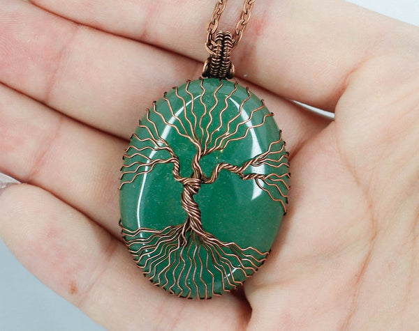 Matching green aventurine tree of life necklaces for couples